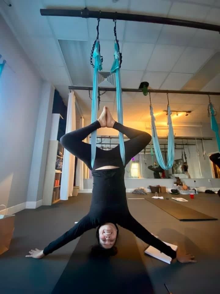 Straddle inversion in an aerial hammock